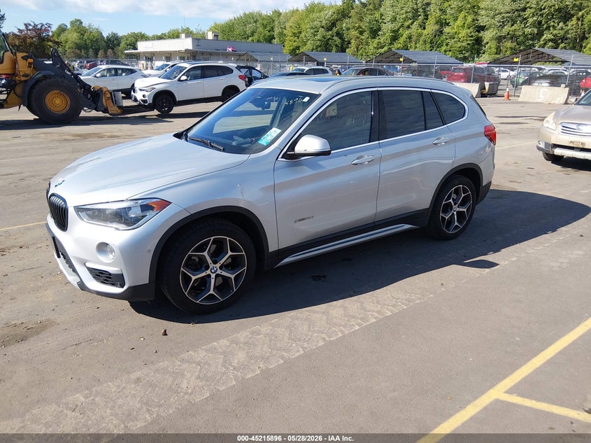 2017 BMW X1 VIN WBXHT3C3XH5F82078 IAAI salvage auction — NORMAL WEAR, Salvage Title, sold $2,250 on 2026-07-16 (photo 2)