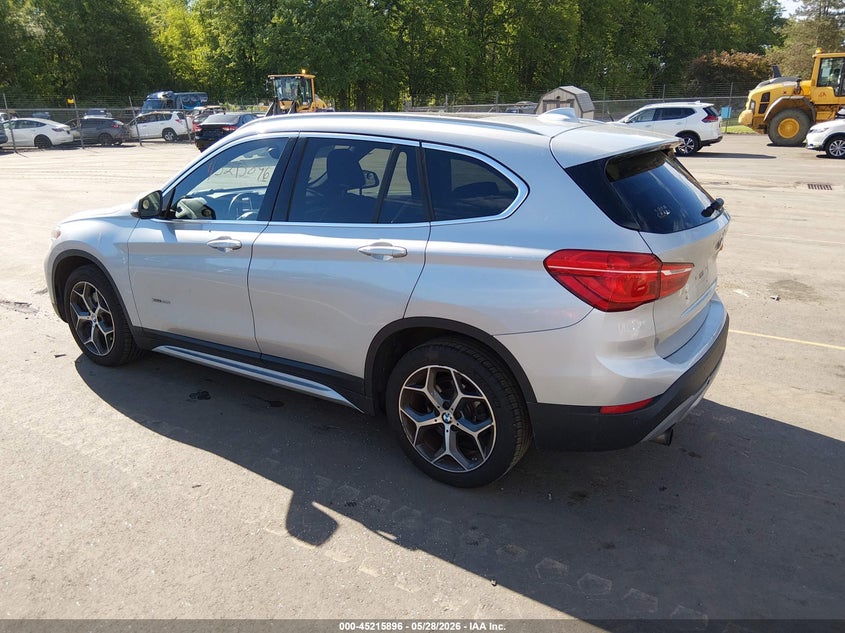 2017 BMW X1 VIN WBXHT3C3XH5F82078 IAAI salvage auction — NORMAL WEAR, Salvage Title, sold $2,250 on 2026-07-16 (photo 3)