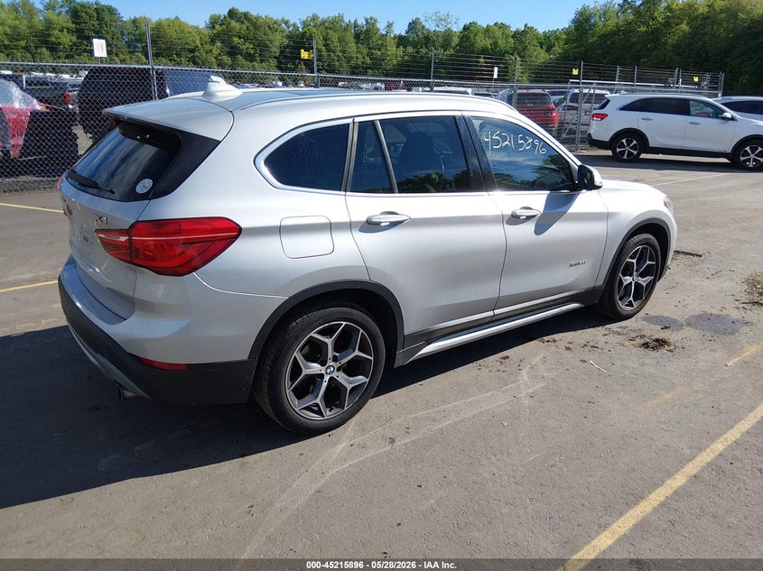 2017 BMW X1 VIN WBXHT3C3XH5F82078 IAAI salvage auction — NORMAL WEAR, Salvage Title, sold $2,250 on 2026-07-16 (photo 4)
