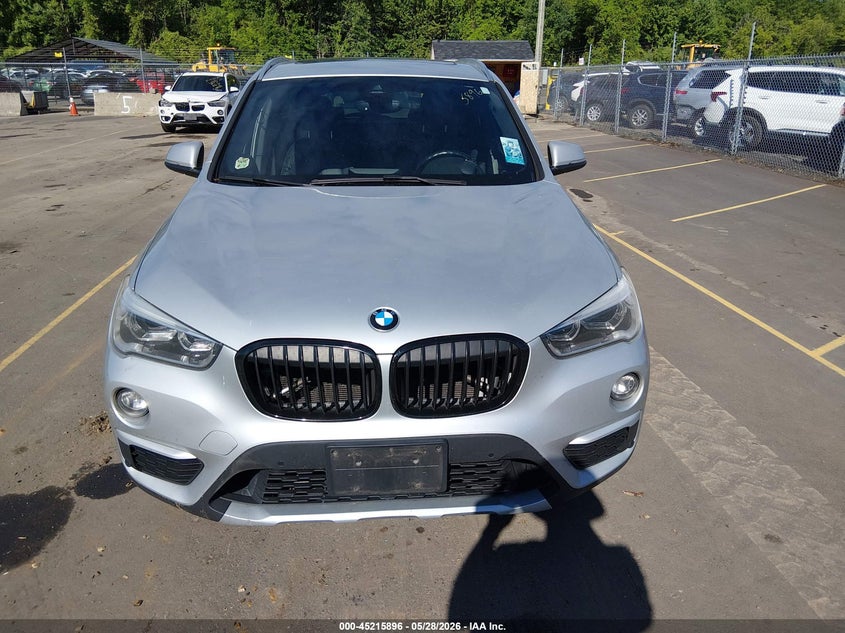 2017 BMW X1 VIN WBXHT3C3XH5F82078 IAAI salvage auction — NORMAL WEAR, Salvage Title, sold $2,250 on 2026-07-16 (photo 6)