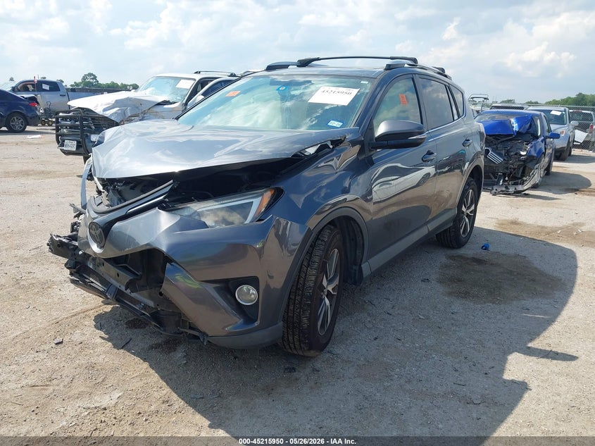 2016 Toyota Rav 4 VIN JTMWFREV1GD086049 IAAI salvage auction — FRONT & REAR, Salvage Title, sold $2,750 on 2026-07-14 (photo 2)