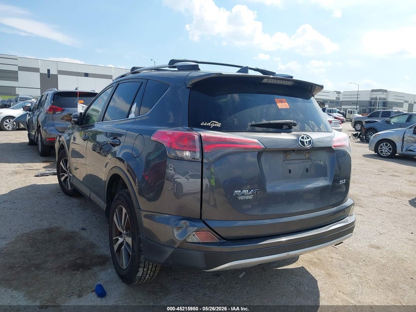 2016 Toyota Rav 4 VIN JTMWFREV1GD086049 IAAI salvage auction — FRONT & REAR, Salvage Title, sold $2,750 on 2026-07-14 (photo 3)