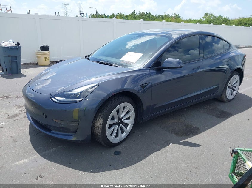 2022 Tesla Model 3 VIN 5YJ3E1EA5NF303645 IAAI salvage auction — RIGHT FRONT, Salvage Title, sold $7,800 on 2026-07-20 (photo 2)