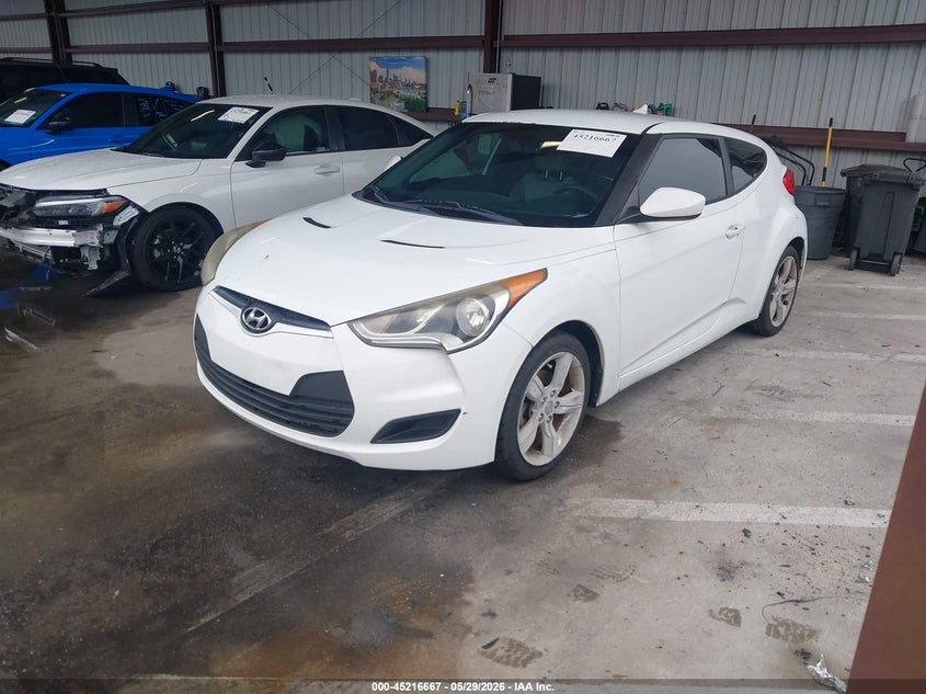 2014 Hyundai Veloster VIN KMHTC6AD4EU185268 IAAI salvage auction — NORMAL WEAR, Clear (Florida), sold $400 on 2026-07-14 (photo 2)