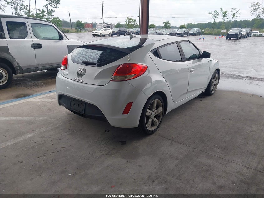 2014 Hyundai Veloster VIN KMHTC6AD4EU185268 IAAI salvage auction — NORMAL WEAR, Clear (Florida), sold $400 on 2026-07-14 (photo 4)