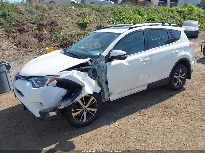 2018 Toyota Rav 4 VIN JTMRFREV6JJ201539 IAAI salvage auction — LEFT FRONT, Salvage Title, sold $6,100 on 2026-08-02 (photo 2)