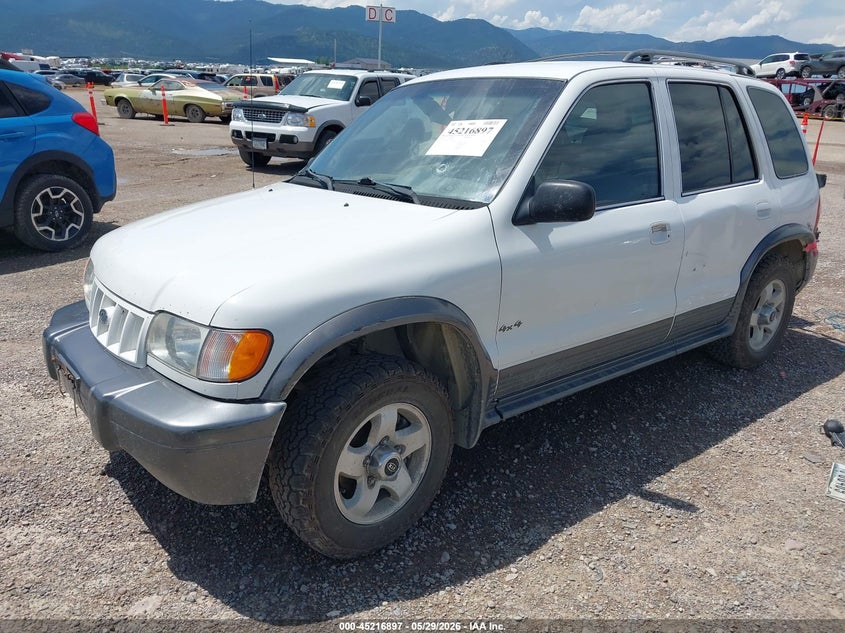 2002 Kia Sportage VIN KNDJA723725158780 IAAI salvage auction — LEFT SIDE, Clear (Montana), sold $150 on 2026-07-08 (photo 2)