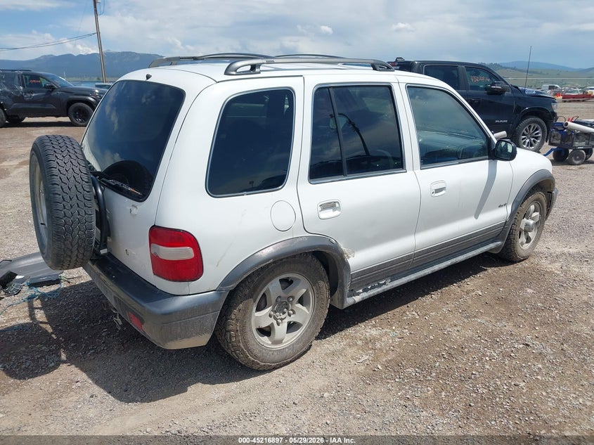 2002 Kia Sportage VIN KNDJA723725158780 IAAI salvage auction — LEFT SIDE, Clear (Montana), sold $150 on 2026-07-08 (photo 4)