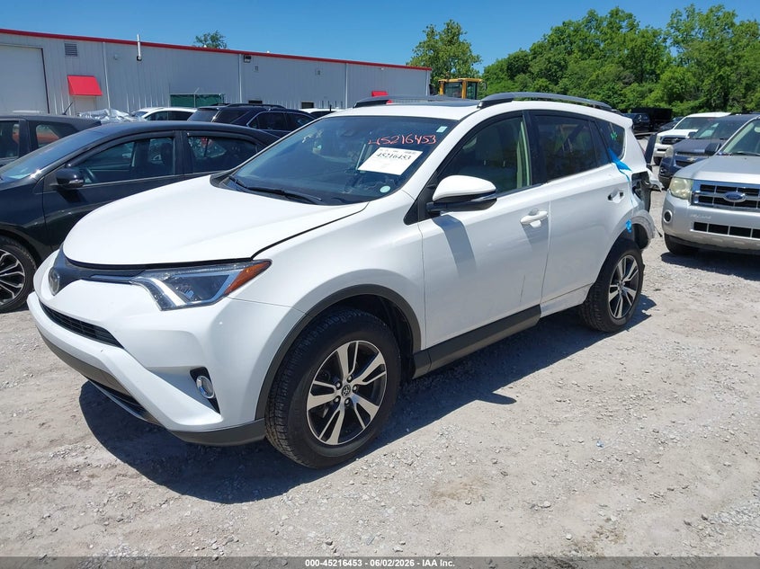 2018 Toyota Rav 4 VIN JTMRFREV5JD228763 IAAI salvage auction — LEFT REAR, Salvage Title, sold $7,400 on 2026-07-06 (photo 2)