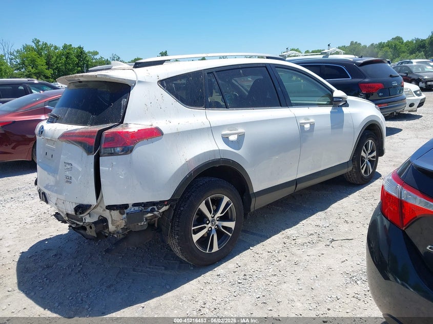 2018 Toyota Rav 4 VIN JTMRFREV5JD228763 IAAI salvage auction — LEFT REAR, Salvage Title, sold $7,400 on 2026-07-06 (photo 4)