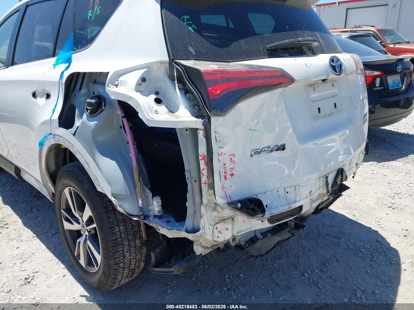 2018 Toyota Rav 4 VIN JTMRFREV5JD228763 IAAI salvage auction — LEFT REAR, Salvage Title, sold $7,400 on 2026-07-06 (photo 6)