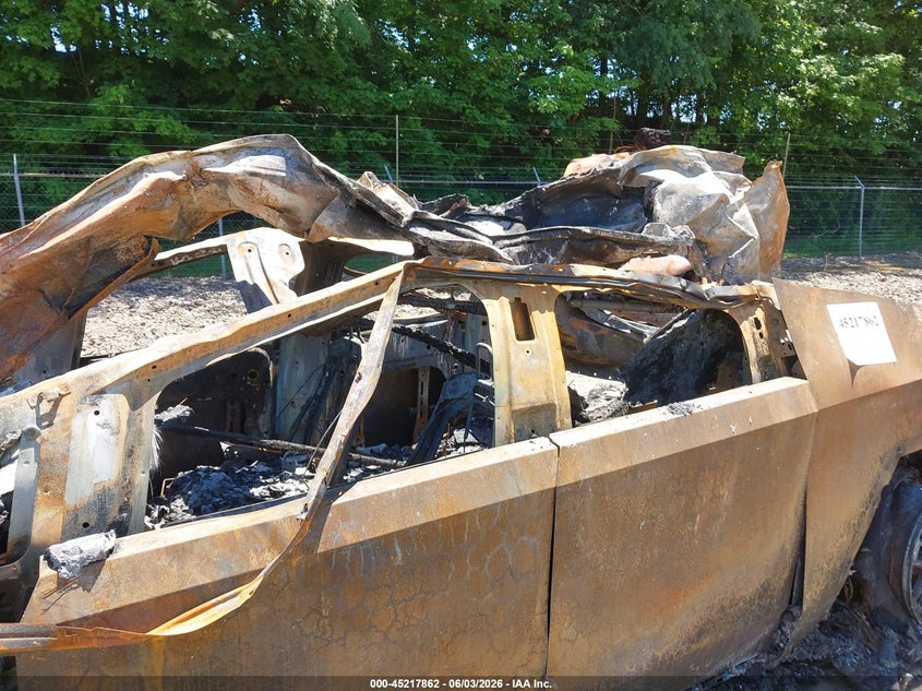 2024 Tesla Cybertruck VIN 7G2CEHED9RA056777 IAAI salvage auction — BURN, Salvage Title, sold $150 on 2026-07-20 (photo 6)