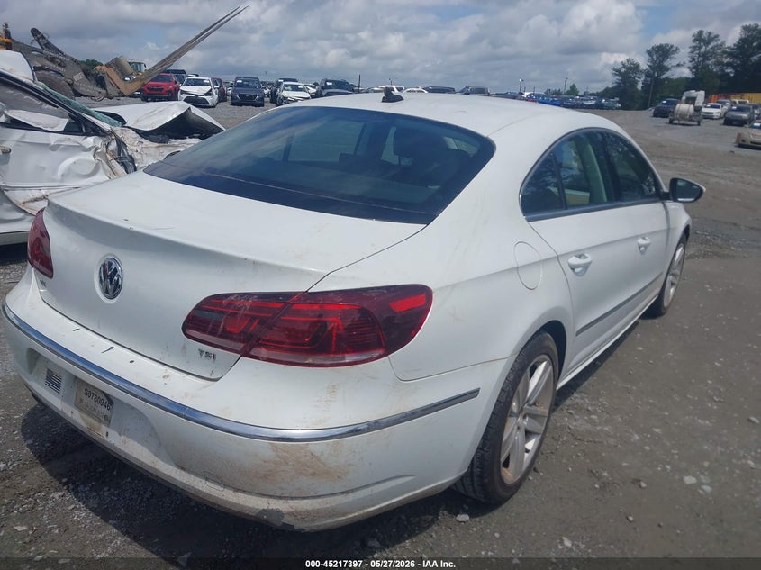 2016 Volkswagen Passat cc VIN WVWBP7AN1GE517750 IAAI salvage auction — NORMAL WEAR, Clear (Georgia), sold $400 on 2026-07-14 (photo 4)
