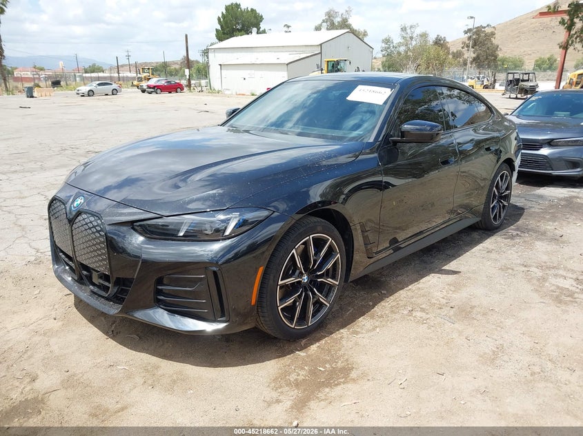 2025 BMW I4 VIN WBY43HD06SFU60439 IAAI salvage auction — REAR END, Salvage (California), sold $21,300 on 2026-08-24 (photo 2)