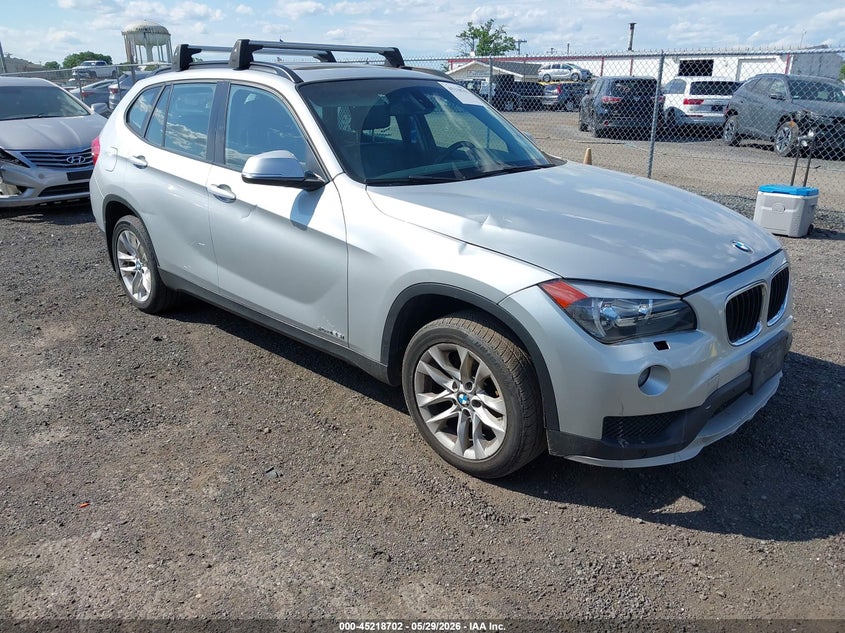 2015 BMW X1 VIN WBAVL1C55FVY29147 IAAI salvage auction — NORMAL WEAR, Clear (New York), sold $600 on 2026-07-06 (photo 1)