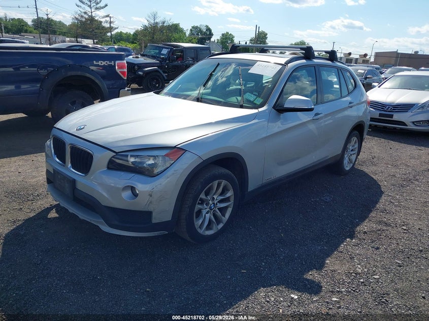 2015 BMW X1 VIN WBAVL1C55FVY29147 IAAI salvage auction — NORMAL WEAR, Clear (New York), sold $600 on 2026-07-06 (photo 2)