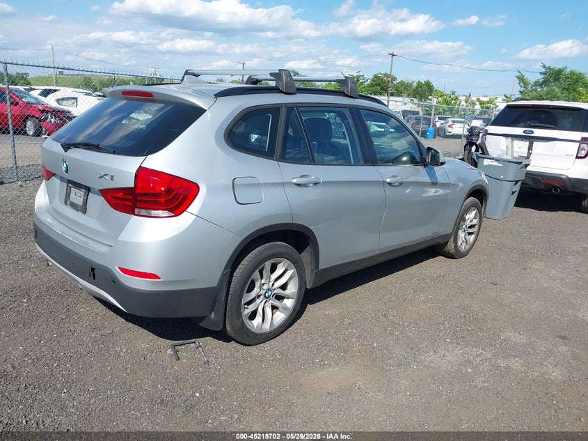 2015 BMW X1 VIN WBAVL1C55FVY29147 IAAI salvage auction — NORMAL WEAR, Clear (New York), sold $600 on 2026-07-06 (photo 4)