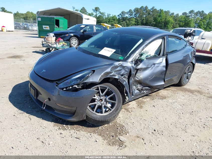 2022 Tesla Model 3 VIN 5YJ3E1EB3NF168903 IAAI salvage auction — SIDE, Salvage Title, sold $3,550 on 2026-07-24 (photo 2)