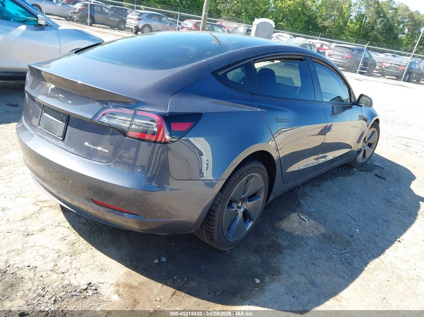 2022 Tesla Model 3 VIN 5YJ3E1EB3NF168903 IAAI salvage auction — SIDE, Salvage Title, sold $3,550 on 2026-07-24 (photo 4)