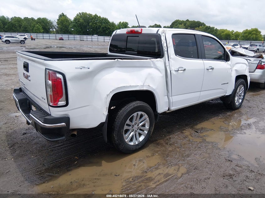 2019 Gmc Canyon VIN 1GTG6DEN2K1132425 IAAI salvage auction — ROLLOVER, Salvage Title, sold $1,850 on 2026-08-26 (photo 4)