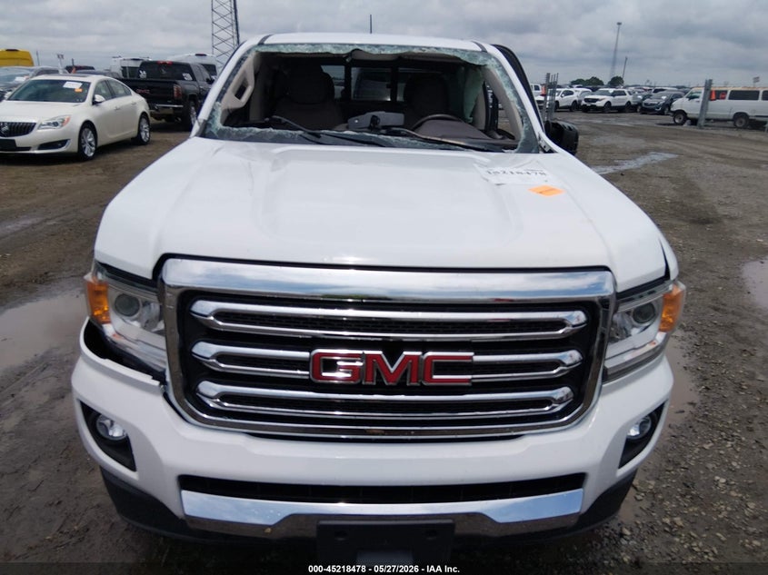 2019 Gmc Canyon VIN 1GTG6DEN2K1132425 IAAI salvage auction — ROLLOVER, Salvage Title, sold $1,850 on 2026-08-26 (photo 6)