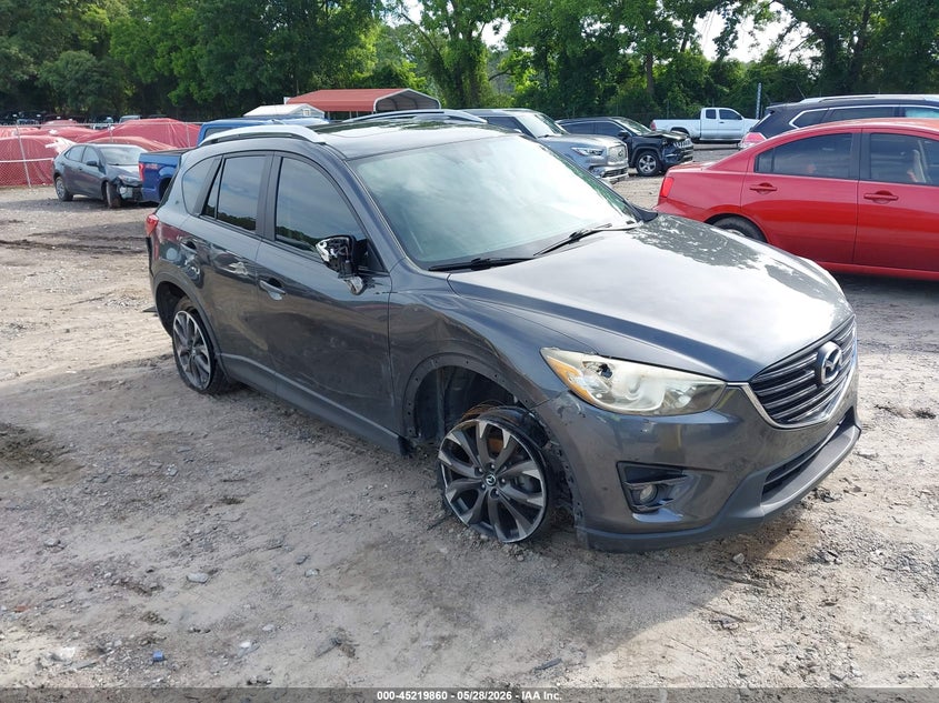 2016 Mazda Cx-5 VIN JM3KE2DY3G0643983 IAAI salvage auction — SIDE, Salvage Title, sold $2,950 on 2026-07-24 (photo 1)