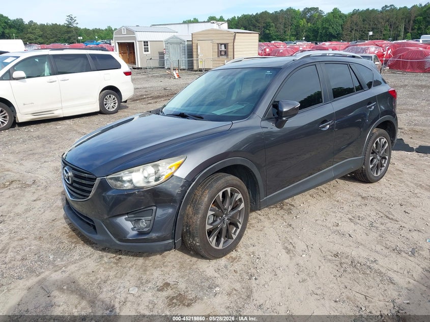 2016 Mazda Cx-5 VIN JM3KE2DY3G0643983 IAAI salvage auction — SIDE, Salvage Title, sold $2,950 on 2026-07-24 (photo 2)