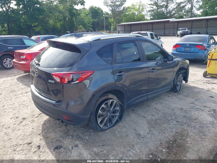 2016 Mazda Cx-5 VIN JM3KE2DY3G0643983 IAAI salvage auction — SIDE, Salvage Title, sold $2,950 on 2026-07-24 (photo 4)