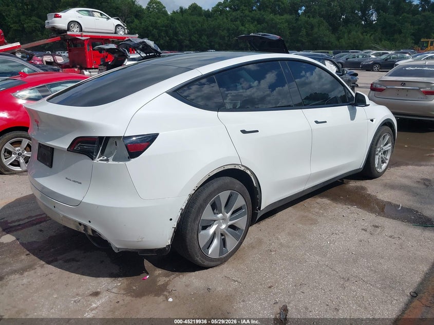 2021 Tesla Model y VIN 5YJYGDEE9MF304896 IAAI salvage auction — REAR END, Salvage Title, sold $10,450 on 2026-07-30 (photo 4)