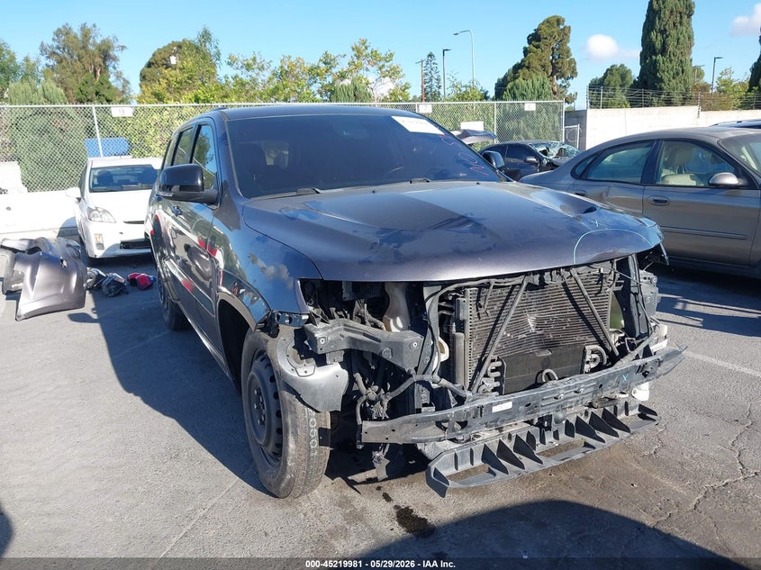 2015 Jeep Grand cherokee VIN 1C4RJFDJ5FC141082 IAAI salvage auction — FRONT END, Salvage Title, sold $10,000 on 2026-07-30 (photo 1)