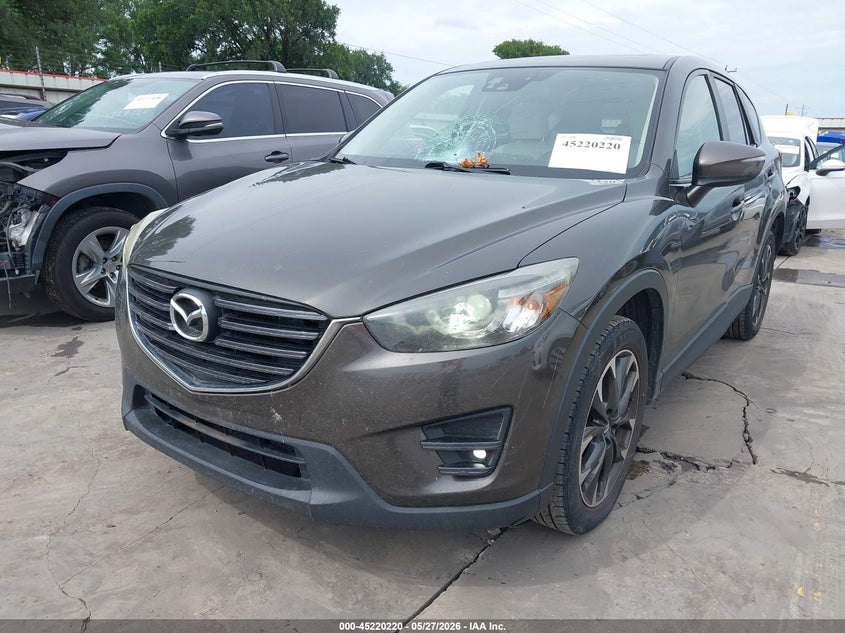 2016 Mazda Cx-5 VIN JM3KE2DY1G0811331 IAAI salvage auction — HAIL, Original (Texas), sold $3,750 on 2026-07-07 (photo 2)