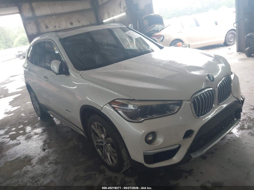 2017 BMW X1 VIN WBXHU7C36H5H32837 IAAI salvage auction — FRONT END, Salvage Title, sold $3,850 on 2026-07-21 (photo 1)