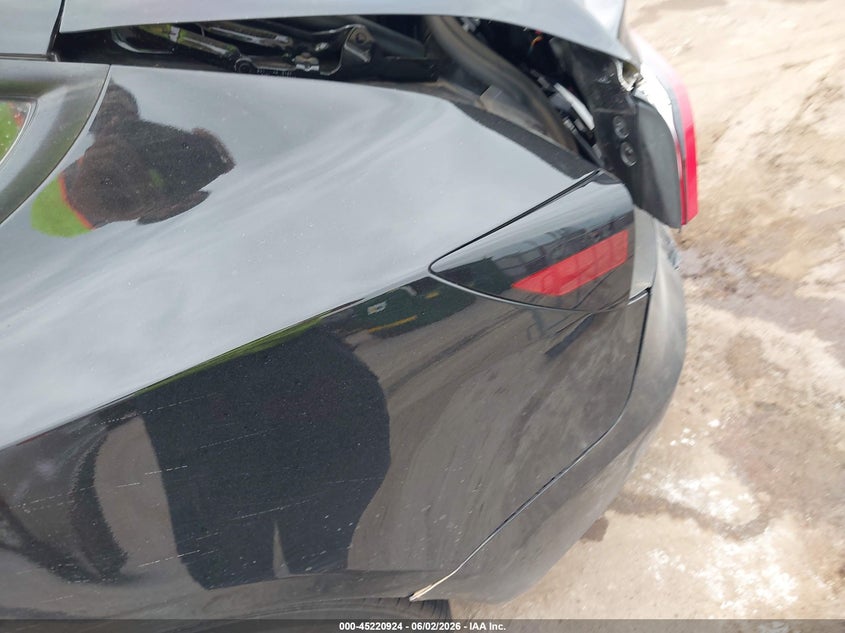 2025 Tesla Model 3 VIN 5YJ3E1EB0SF935506 IAAI salvage auction — REAR END, Salvage Title, sold $16,950 on 2026-07-15 (photo 6)