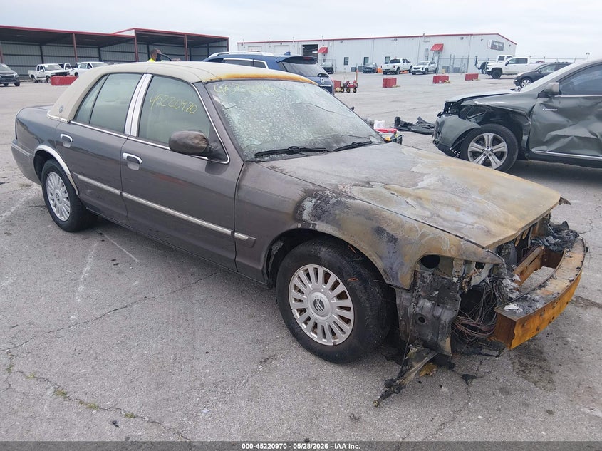 2007 Mercury Grand marquis VIN 2MEFM75V07X611443 IAAI salvage auction — ENGINE BURN, Salvage (Missouri), sold $250 on 2026-07-09 (photo 1)