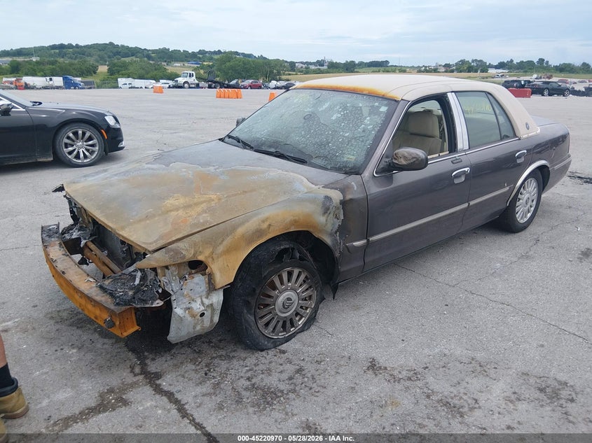 2007 Mercury Grand marquis VIN 2MEFM75V07X611443 IAAI salvage auction — ENGINE BURN, Salvage (Missouri), sold $250 on 2026-07-09 (photo 2)