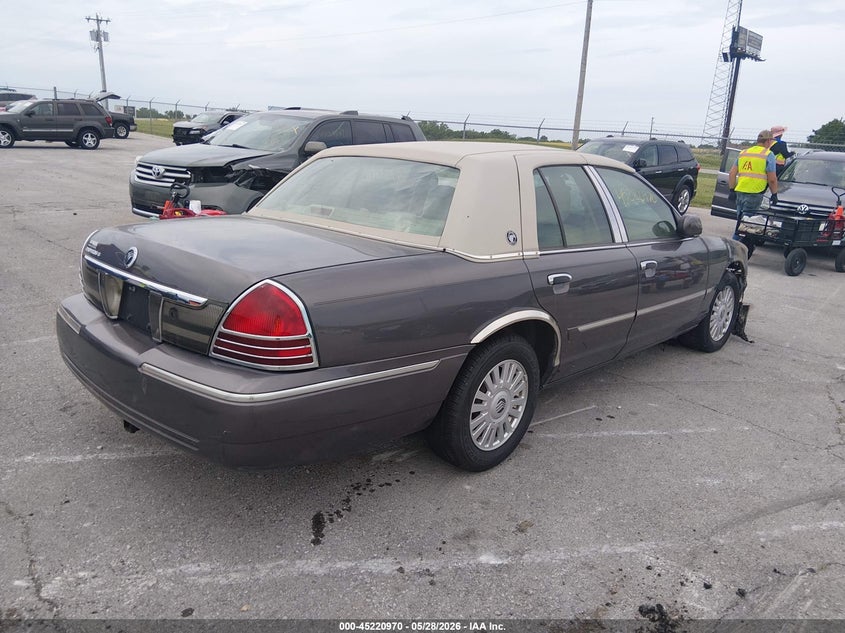 2007 Mercury Grand marquis VIN 2MEFM75V07X611443 IAAI salvage auction — ENGINE BURN, Salvage (Missouri), sold $250 on 2026-07-09 (photo 4)