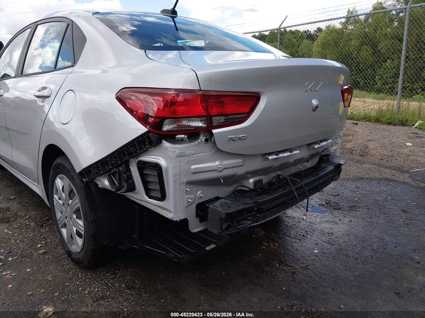 2023 Kia Rio VIN 3KPA24AD3PE614484 IAAI salvage auction — REAR END, Salvage Title, sold $6,025 on 2026-09-08 (photo 6)