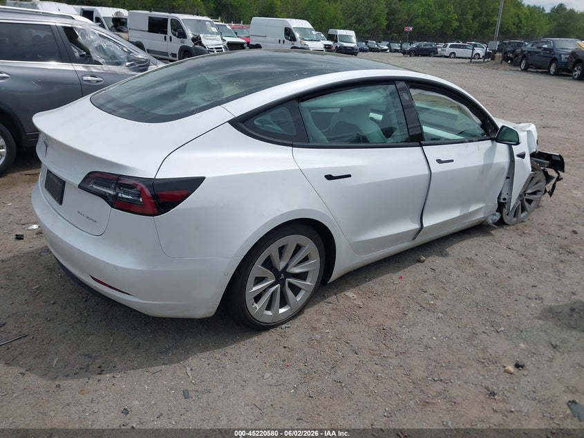 2021 Tesla Model 3 VIN 5YJ3E1EB7MF990344 IAAI salvage auction — RIGHT FRONT, Salvage (Massachusetts), sold $5,400 on 2026-07-30 (photo 4)