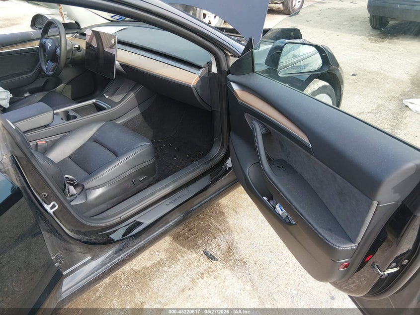 2023 Tesla Model 3 VIN 5YJ3E1EA0PF669760 IAAI salvage auction — REAR END, Salvage Title, sold $8,550 on 2026-07-16 (photo 5)