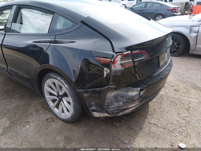 2023 Tesla Model 3 VIN 5YJ3E1EA0PF669760 IAAI salvage auction — REAR END, Salvage Title, sold $8,550 on 2026-07-16 (photo 6)