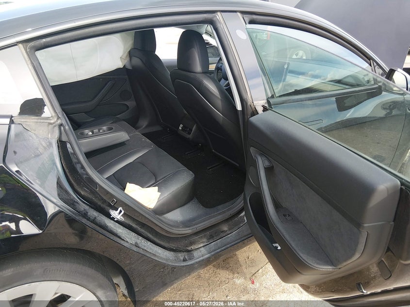 2023 Tesla Model 3 VIN 5YJ3E1EA0PF669760 IAAI salvage auction — REAR END, Salvage Title, sold $8,550 on 2026-07-16 (photo 8)