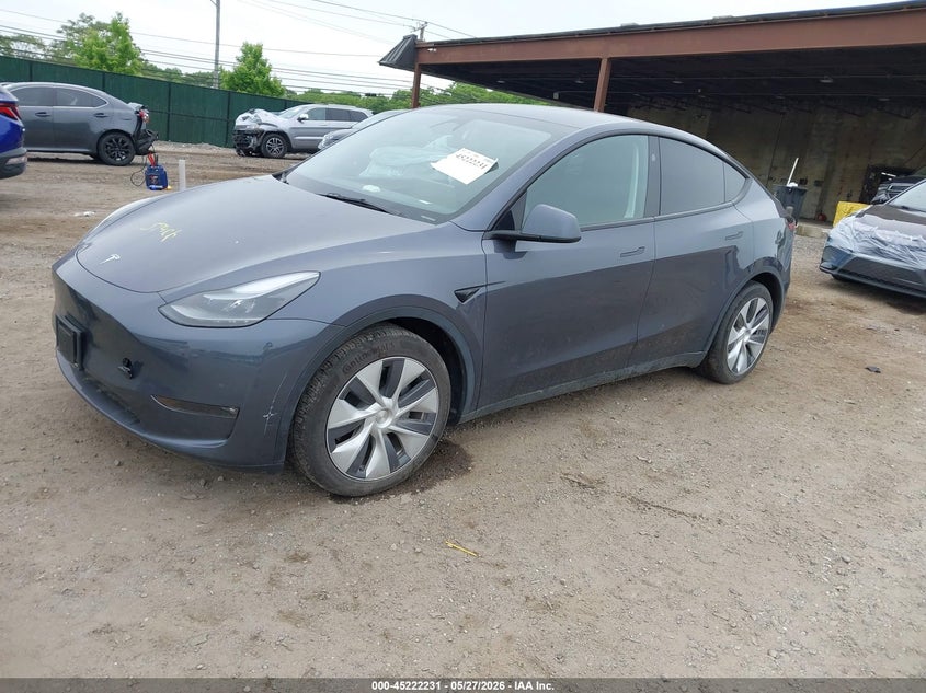 2023 Tesla Model y VIN 7SAYGDEE8PF845638 IAAI salvage auction — WATER/FLOOD, Mv-907A (New York), sold $9,100 on 2026-07-23 (photo 2)