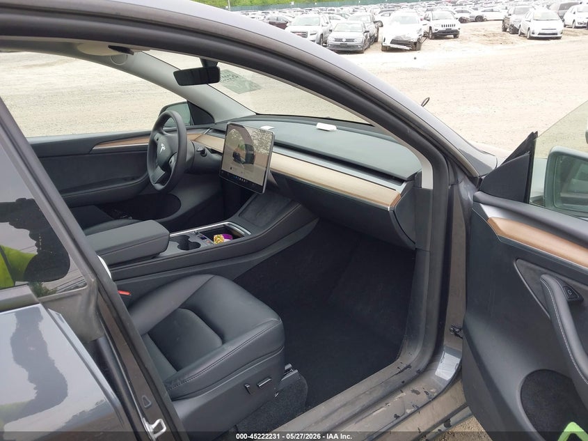 2023 Tesla Model y VIN 7SAYGDEE8PF845638 IAAI salvage auction — WATER/FLOOD, Mv-907A (New York), sold $9,100 on 2026-07-23 (photo 5)