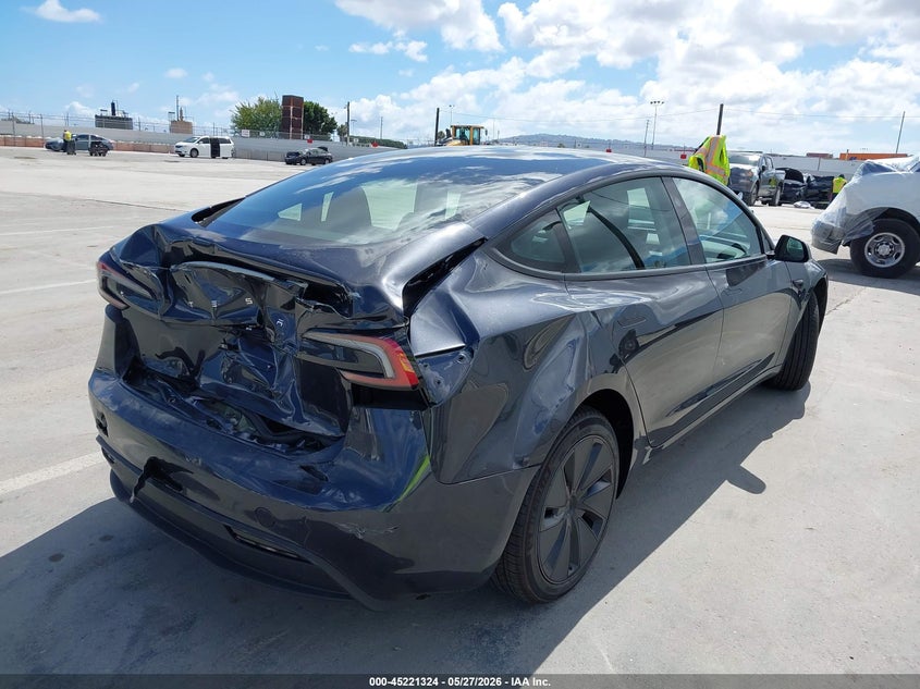 2025 Tesla Model 3 VIN 5YJ3E1EA1SF920925 IAAI salvage auction — FRONT & REAR, Salvage Title, sold $9,600 on 2026-07-06 (photo 4)