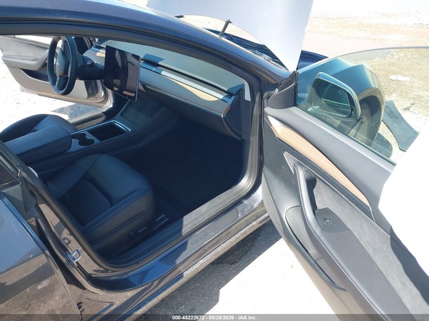 2023 Tesla Model 3 VIN 5YJ3E1EA4PF697187 IAAI salvage auction — SIDE, Salvage Title, sold $8,300 on 2026-07-10 (photo 5)