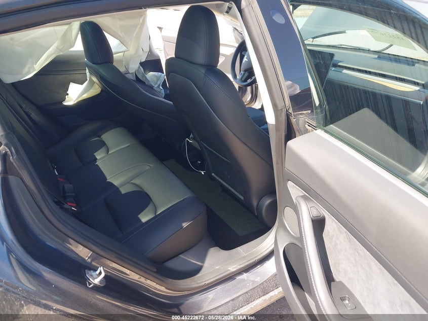 2023 Tesla Model 3 VIN 5YJ3E1EA4PF697187 IAAI salvage auction — SIDE, Salvage Title, sold $8,300 on 2026-07-10 (photo 8)
