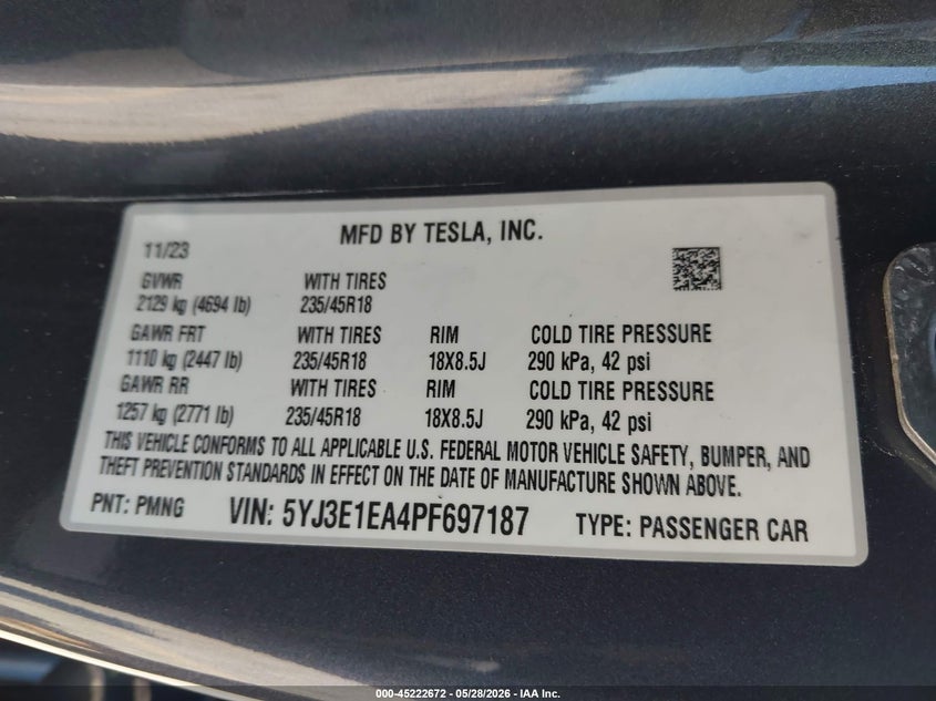2023 Tesla Model 3 VIN 5YJ3E1EA4PF697187 IAAI salvage auction — SIDE, Salvage Title, sold $8,300 on 2026-07-10 (photo 9)