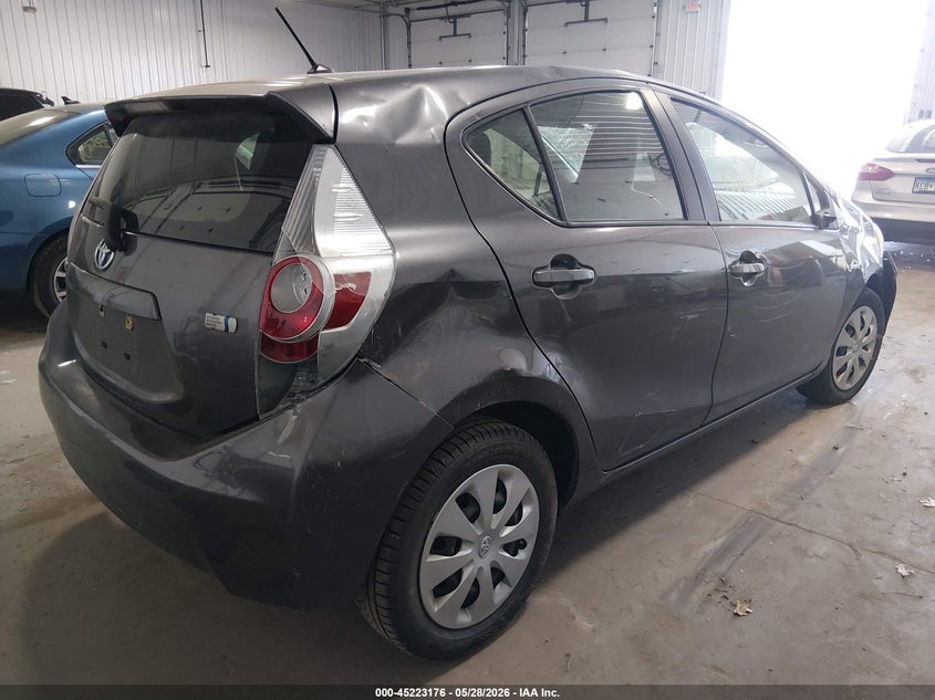 2014 Toyota Prius c VIN JTDKDTB30E1563086 IAAI salvage auction — UNKNOWN, Prior Salvage (Minnesota), sold $350 on 2026-07-29 (photo 4)