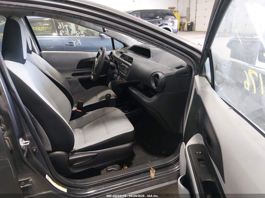 2014 Toyota Prius c VIN JTDKDTB30E1563086 IAAI salvage auction — UNKNOWN, Prior Salvage (Minnesota), sold $350 on 2026-07-29 (photo 5)