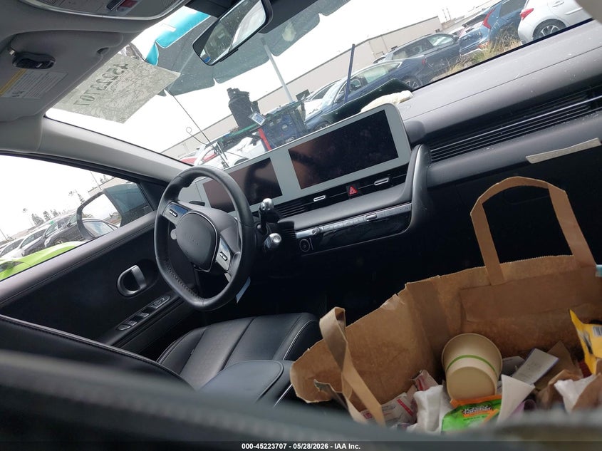 2022 Hyundai Ioniq 5 VIN KM8KNDAF3NU104045 IAAI salvage auction — SIDE, Salvage Title, sold $8,300 on 2026-07-11 (photo 5)